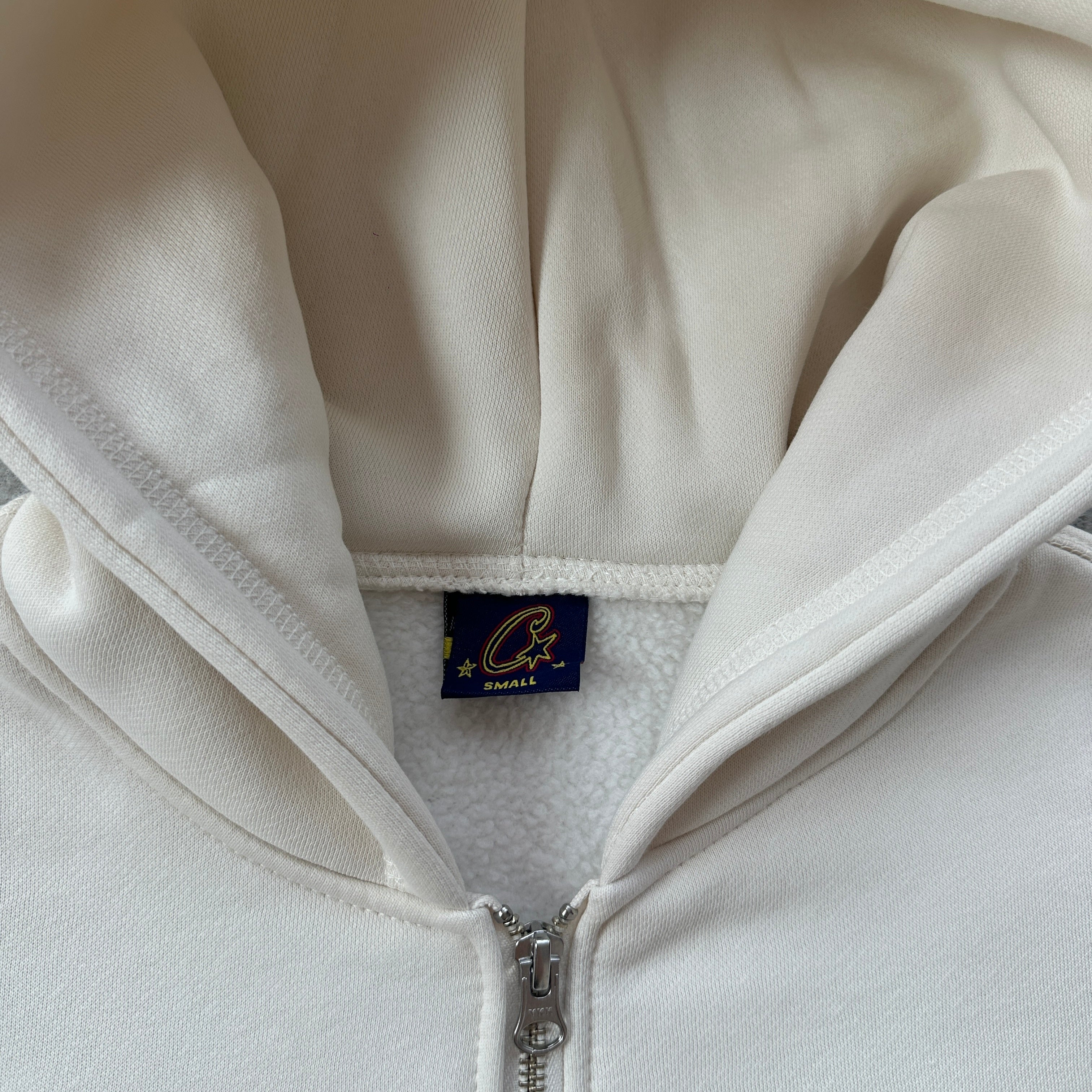 corteiz island puff print zip set [off white]